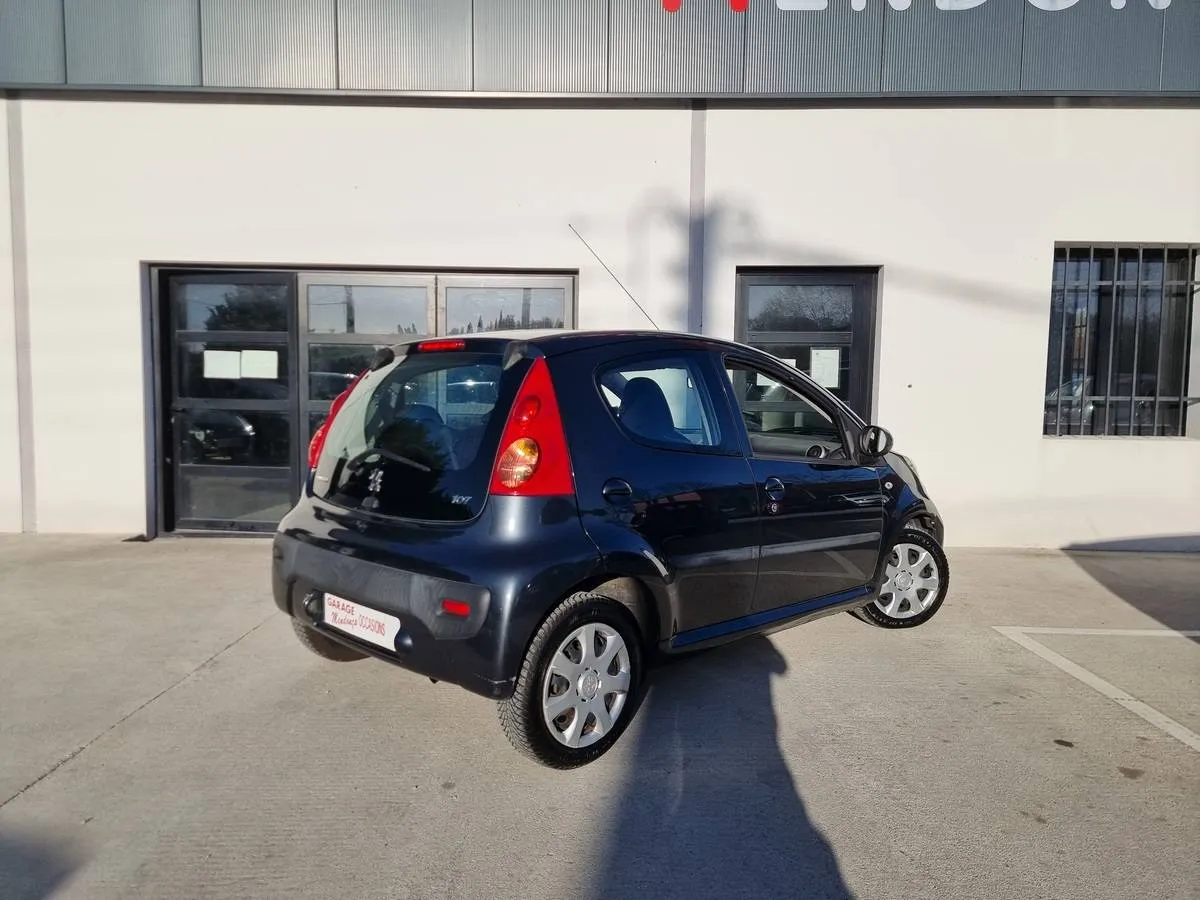 Peugeot 107 2011 — photo 4