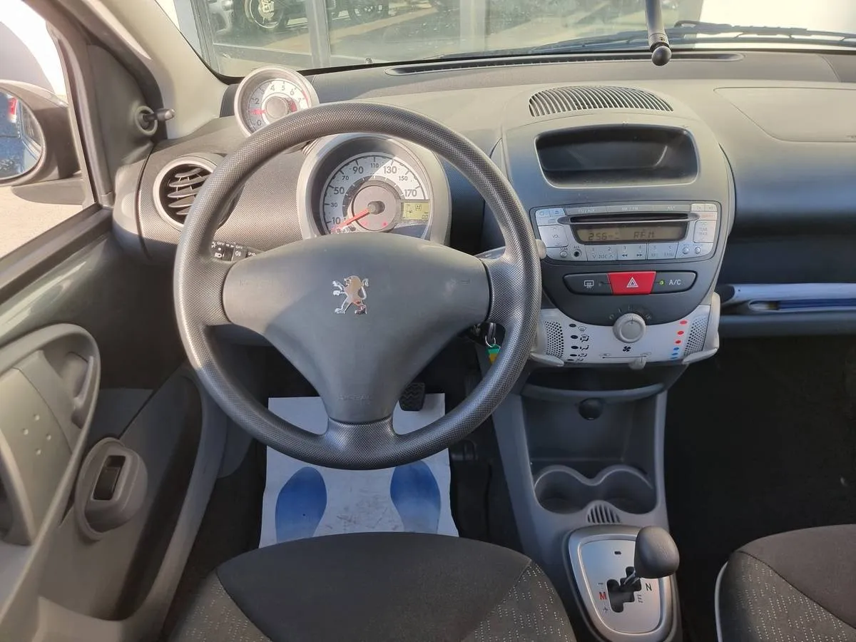 Peugeot 107 2011 — photo 6